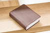 The Jesus Bible: New International Version, Brown, Leathersoft: Sixty-Six Books. One Story. All About One Name. Imitation Leather